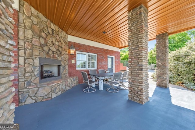 988 Hunters Rdg, Jasper, GA 30143 - view of patio featuring an outdoor stone fireplace and outdoor dining space