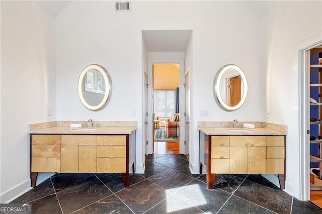 4835 Merlendale Ct, Atlanta, GA 30327 - bathroom with two vanities, visible vents, and a sink
