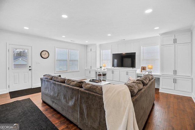 living area featuring recessed lighting, ornamental molding, and dark wood-style floors