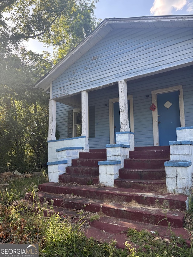 bungalow-style home with a porch