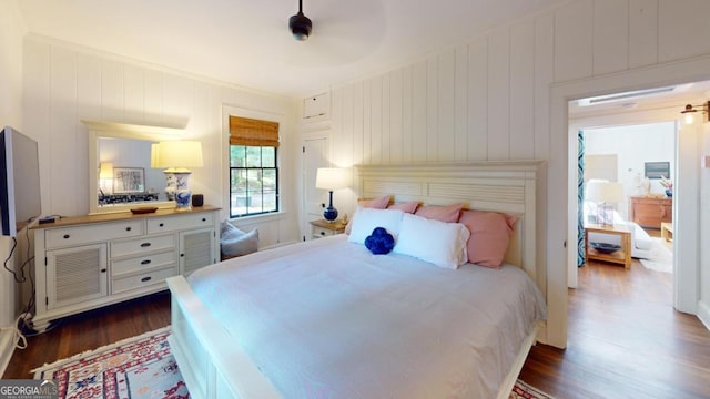 bedroom featuring dark wood-type flooring