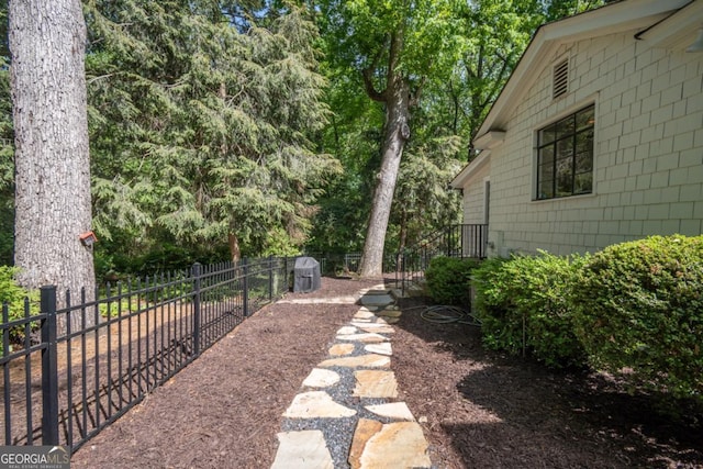 view of yard featuring fence