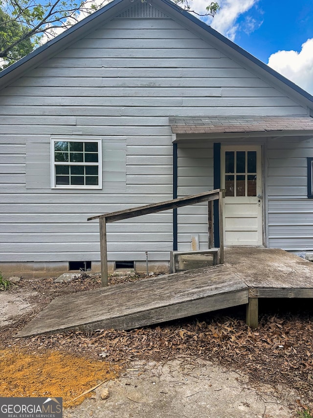 183 S Pine St, Toccoa, GA 30577 - back of property with a deck
