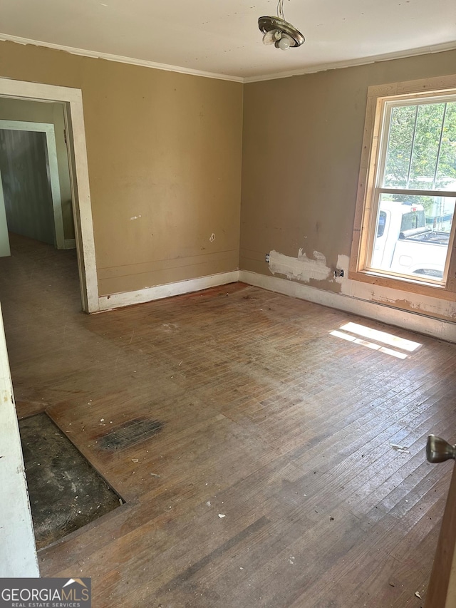 183 S Pine St, Toccoa, GA 30577 - unfurnished room featuring hardwood / wood-style flooring, baseboards, and crown molding