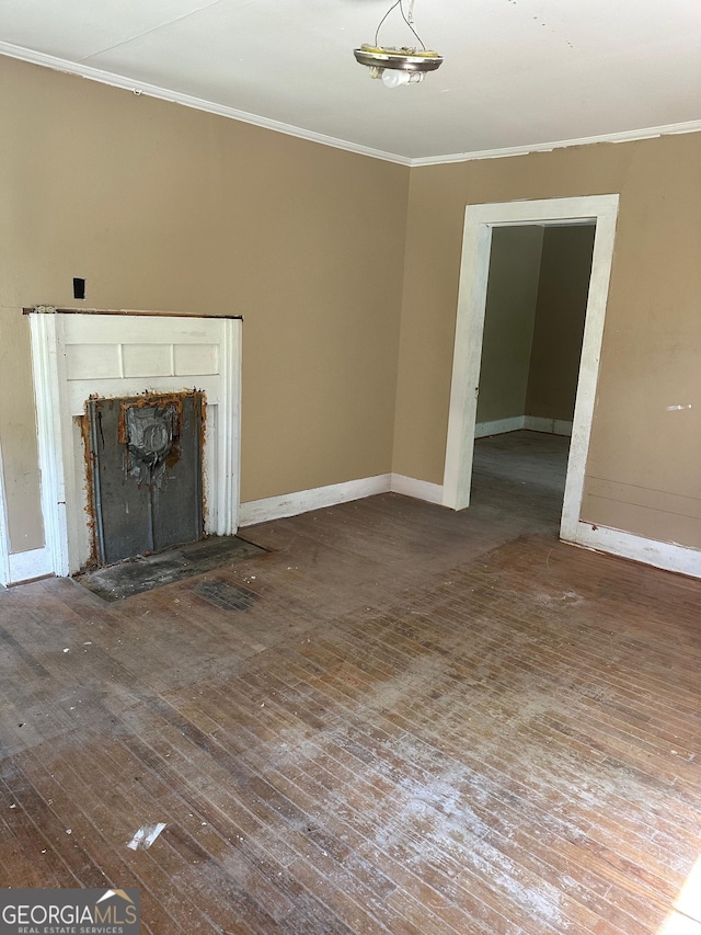 183 S Pine St, Toccoa, GA 30577 - unfurnished living room with a fireplace with flush hearth, baseboards, ornamental molding, and dark wood finished floors