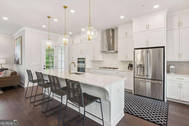 427 Burton Dr Unit 427, Alpharetta, GA 30009 - kitchen featuring stainless steel appliances, wall chimney exhaust hood, backsplash, light countertops, and ornamental molding