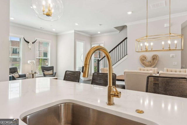 427 Burton Dr Unit 427, Alpharetta, GA 30009 - kitchen view of a chandelier, pendant lighting, ornamental molding, and recessed lighting