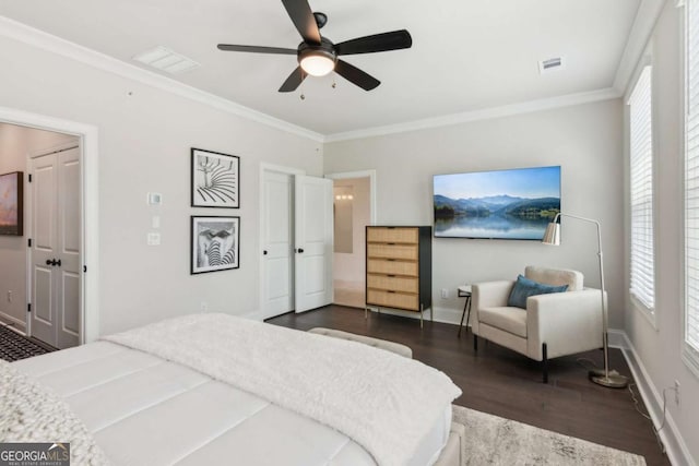 427 Burton Dr Unit 427, Alpharetta, GA 30009 - bedroom with dark wood-style flooring, crown molding, and a ceiling fan