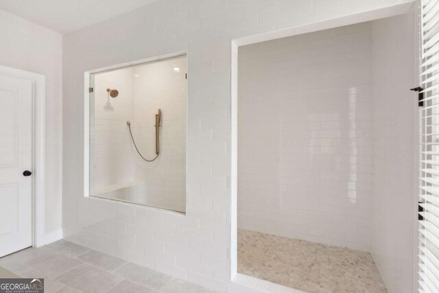 427 Burton Dr Unit 427, Alpharetta, GA 30009 - bathroom featuring walk in shower and tile patterned floors