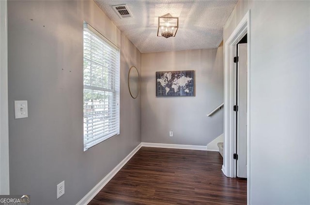 50 Westside Chase, Cartersville, GA 30120 - interior space featuring wood finished floors, a textured ceiling, stairs, baseboards, and visible vents