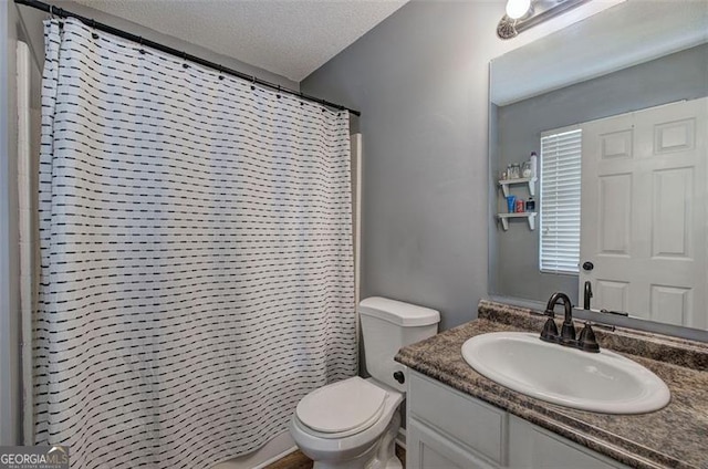 50 Westside Chase, Cartersville, GA 30120 - bathroom featuring toilet, vanity, a textured ceiling, and curtained shower