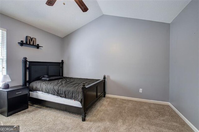 50 Westside Chase, Cartersville, GA 30120 - bedroom featuring baseboards, lofted ceiling, a ceiling fan, and light carpet