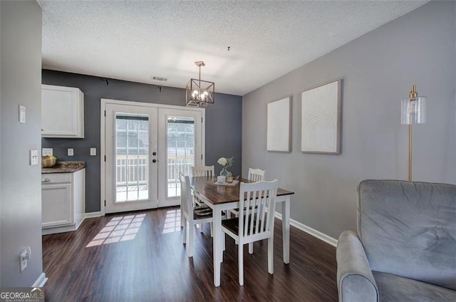50 Westside Chase, Cartersville, GA 30120 - dining area with dark wood-style floors, a chandelier, french doors, baseboards, and visible vents