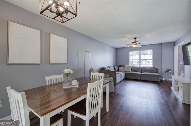 50 Westside Chase, Cartersville, GA 30120 - dining room featuring dark wood-type flooring and ceiling fan with notable chandelier