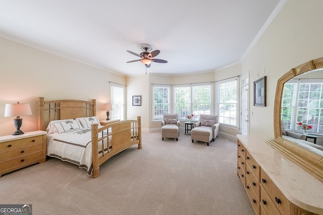 bedroom with baseboards, a ceiling fan, ornamental molding, and light colored carpet