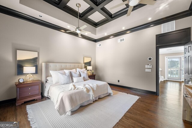 bedroom featuring visible vents, a towering ceiling, baseboards, and coffered ceiling