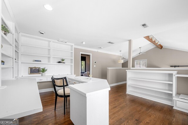 kitchen with dark wood-style flooring, visible vents, open shelves, light countertops, and an island with sink