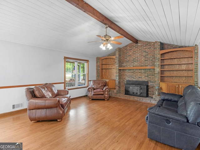 930 Singley Dr, Locust Grove, GA 30248 - living area with lofted ceiling with beams, light wood-style floors, ceiling fan, baseboards, and visible vents