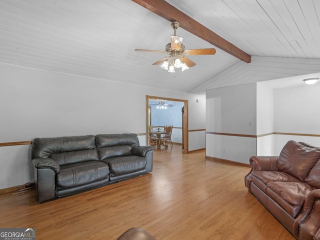 930 Singley Dr, Locust Grove, GA 30248 - living room with wood finished floors, vaulted ceiling with beams, wood ceiling, ceiling fan, and baseboards