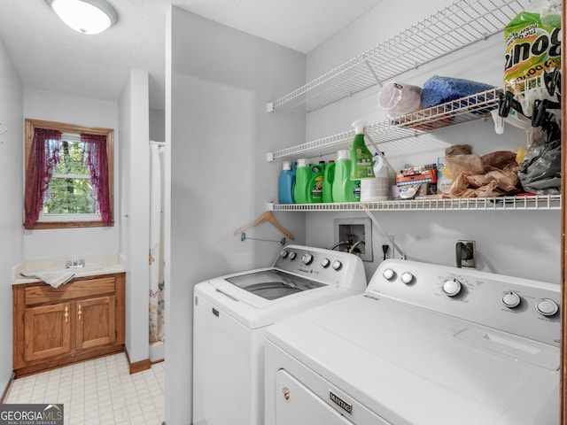 930 Singley Dr, Locust Grove, GA 30248 - clothes washing area featuring baseboards, washer and clothes dryer, laundry area, and a sink