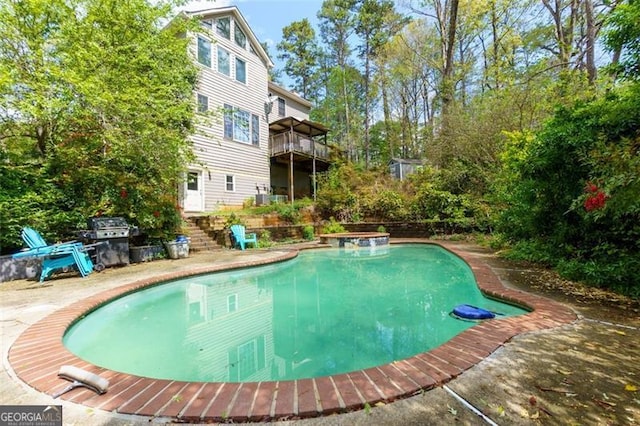 225 Nacoochee Dr, Woodstock, GA 30188 - view of swimming pool featuring a pool with connected hot tub