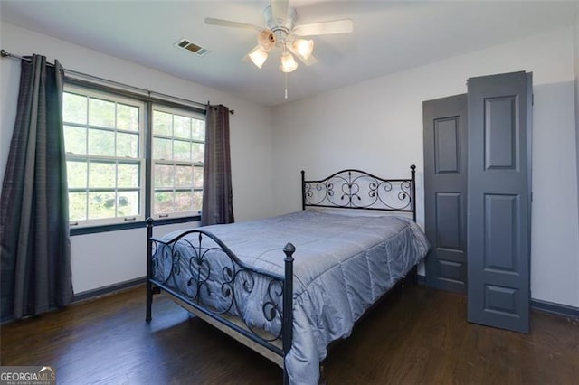 225 Nacoochee Dr, Woodstock, GA 30188 - bedroom with a ceiling fan, visible vents, wood finished floors, and baseboards