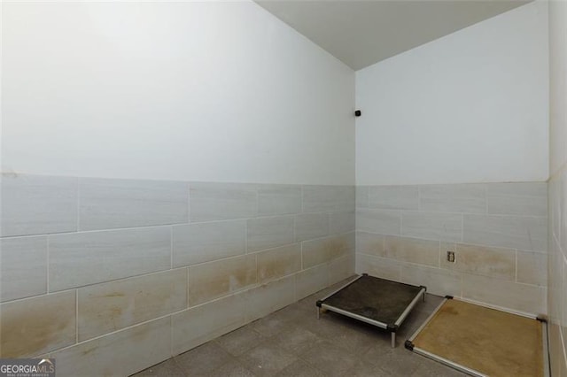 225 Nacoochee Dr, Woodstock, GA 30188 - bathroom with tile walls and wainscoting