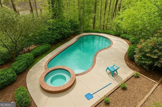 225 Nacoochee Dr, Woodstock, GA 30188 - view of swimming pool with a pool with connected hot tub
