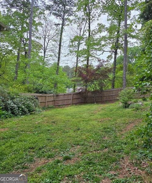 225 Nacoochee Dr, Woodstock, GA 30188 - view of yard with fence