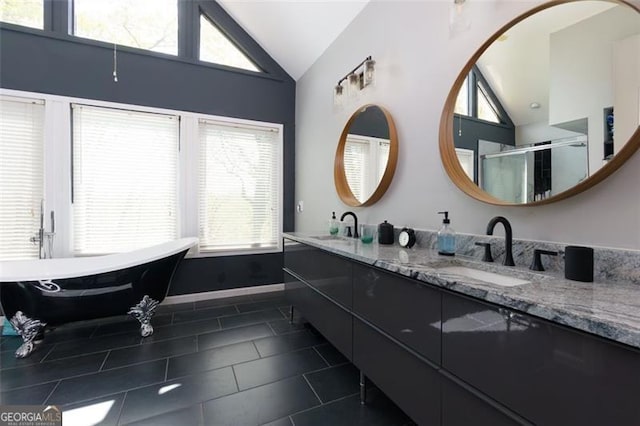 225 Nacoochee Dr, Woodstock, GA 30188 - bathroom with plenty of natural light, tile patterned floors, and a sink