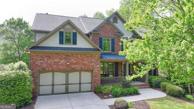 2725 Monet Dr, Cumming, GA 30041 - craftsman inspired home with a shingled roof, an attached garage, brick siding, a porch, and concrete driveway