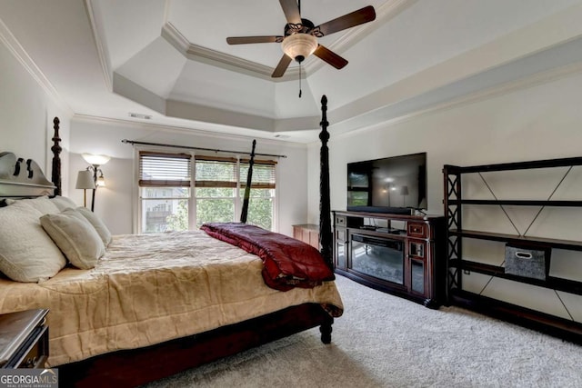 2725 Monet Dr, Cumming, GA 30041 - bedroom with carpet floors, ornamental molding, visible vents, ceiling fan, and a tray ceiling