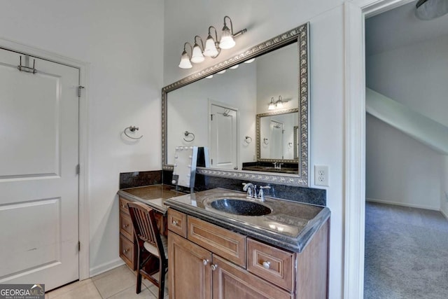 2725 Monet Dr, Cumming, GA 30041 - bathroom featuring tile patterned floors, baseboards, and vanity