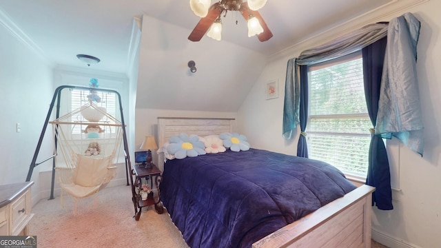 bedroom featuring baseboards, light colored carpet, lofted ceiling, a ceiling fan, and ornamental molding