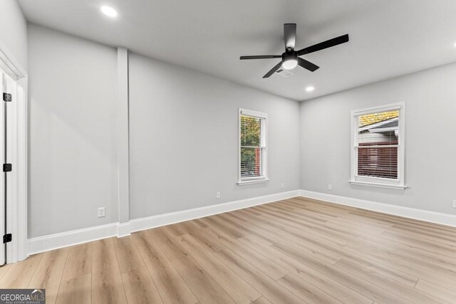 spare room featuring recessed lighting, light wood finished floors, and ceiling fan