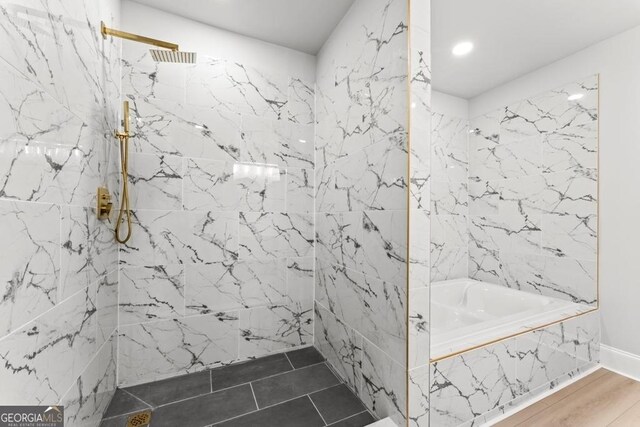 full bath featuring a bath, a marble finish shower, and recessed lighting