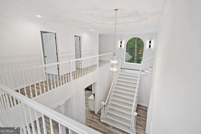 515 Old Chartwell Xing, Alpharetta, GA 30022 - stairs with recessed lighting, an inviting chandelier, ornamental molding, and wood finished floors
