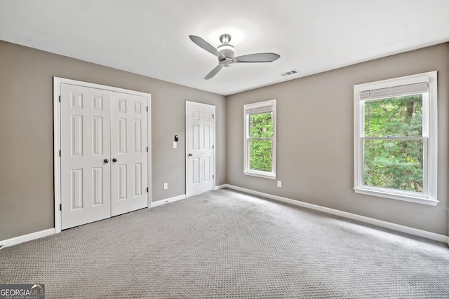 515 Old Chartwell Xing, Alpharetta, GA 30022 - unfurnished bedroom featuring baseboards, ceiling fan, carpet floors, and visible vents