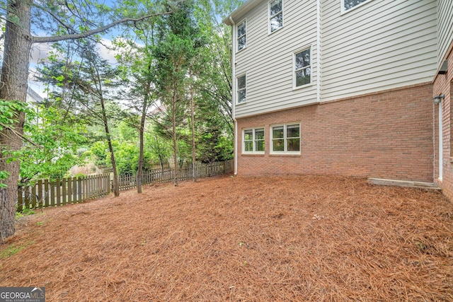515 Old Chartwell Xing, Alpharetta, GA 30022 - view of yard featuring fence