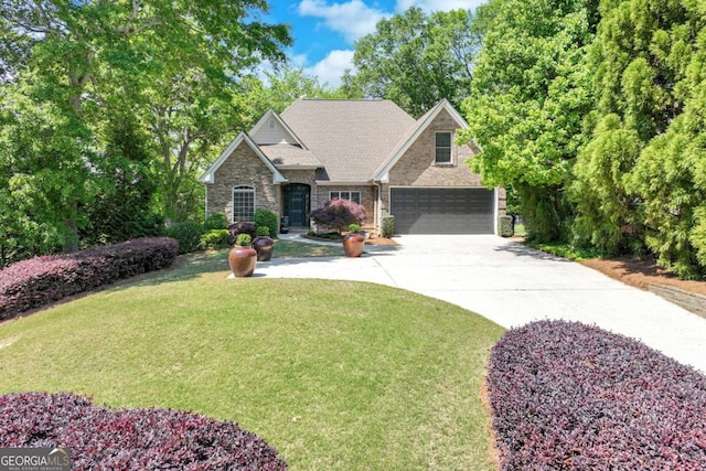 200 Piedmont Ave, Gainesville, GA 30501 - view of front of property with concrete driveway, stone siding, and a front yard