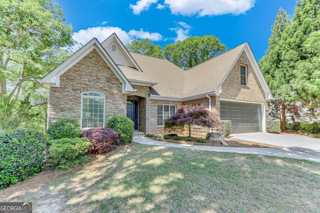 200 Piedmont Ave, Gainesville, GA 30501 - view of front facade with a shingled roof, a front lawn, an attached garage, driveway, and stone siding