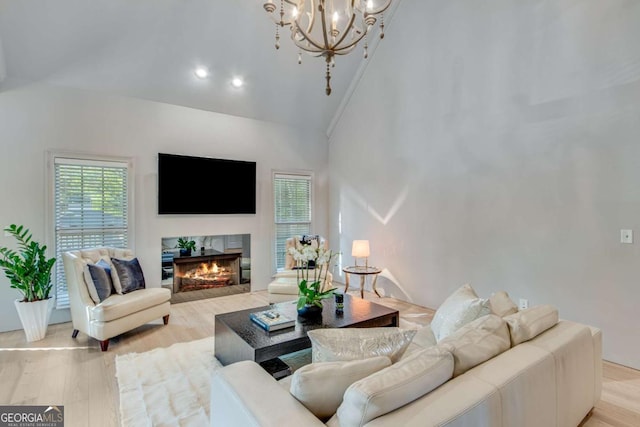 200 Piedmont Ave, Gainesville, GA 30501 - living area featuring vaulted ceiling, a healthy amount of sunlight, and light wood-style flooring