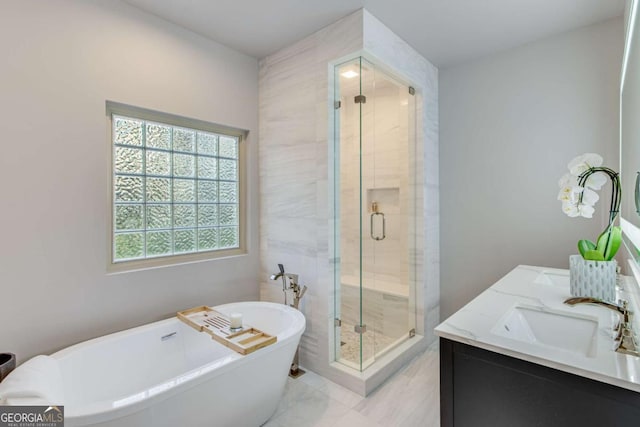 200 Piedmont Ave, Gainesville, GA 30501 - full bath featuring a shower stall, marble finish floor, double vanity, a sink, and a freestanding tub