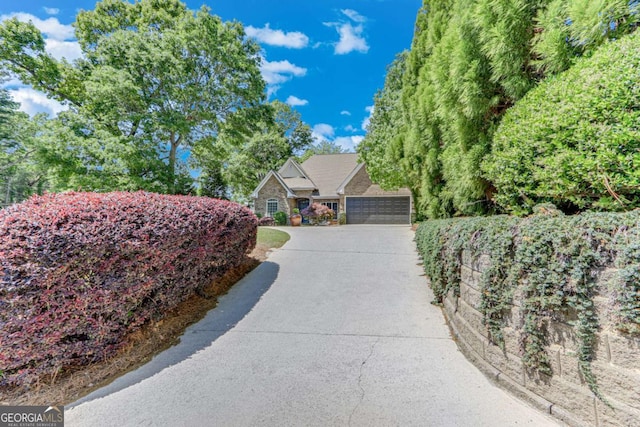 200 Piedmont Ave, Gainesville, GA 30501 - view of property exterior featuring a garage and concrete driveway