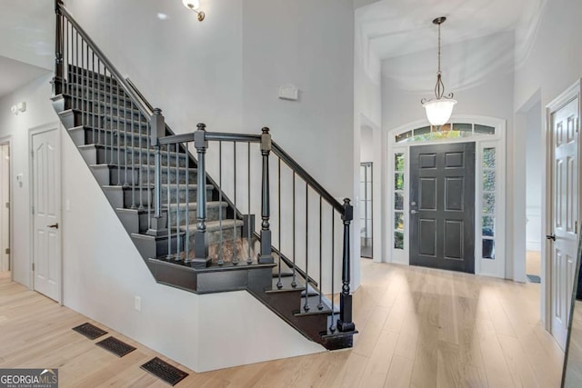200 Piedmont Ave, Gainesville, GA 30501 - entryway with a towering ceiling, wood finished floors, and stairway