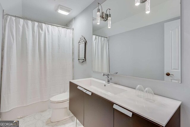 200 Piedmont Ave, Gainesville, GA 30501 - bathroom featuring shower / bath combination with curtain, vanity, and toilet