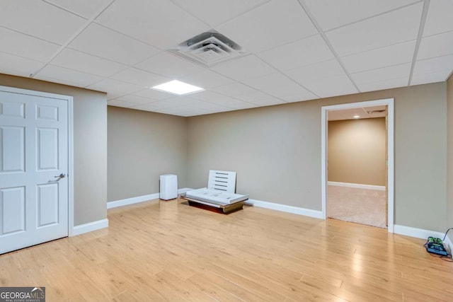 200 Piedmont Ave, Gainesville, GA 30501 - interior space featuring visible vents, baseboards, a paneled ceiling, and wood finished floors