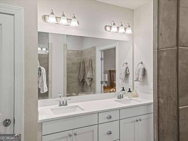 bathroom featuring double vanity and a sink