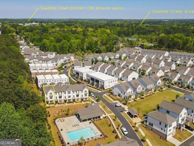 bird's eye view with a view of trees and a residential view