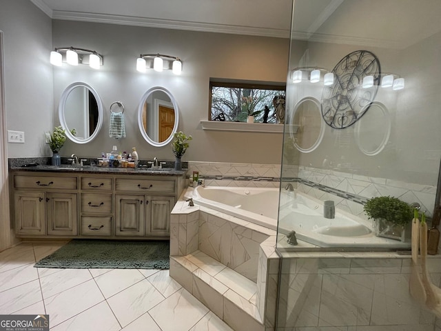 full bath with a garden tub, marble finish floor, ornamental molding, and a sink